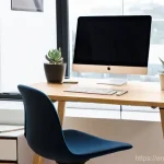 Home 14 작업 효율을 높이는 원격근무 공간 정리법 - **Prompt:** A bright and inviting home office space, meticulously organized and ergonomically optimi...